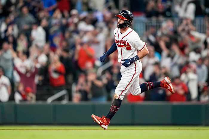 Braves shortstop Dansby Swanson runs the bases after hitting a home run.