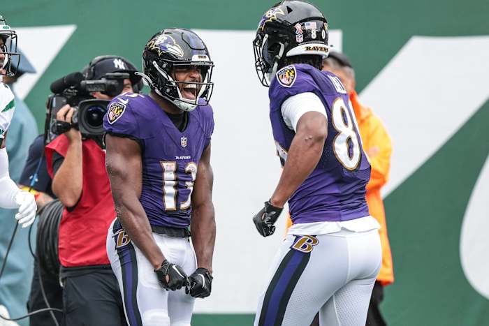 Devin Duvernay and Isaiah Likely celebrate a touchdown against the Jets