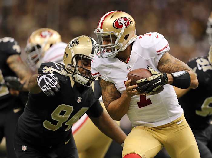 Nov 9, 2014; San Francisco 49ers quarterback Colin Kaepernick (7) is sacked by New Orleans Saints defensive end Cameron Jordan (94). Mandatory Credit: Chuck Cook-USA TODAY Sports