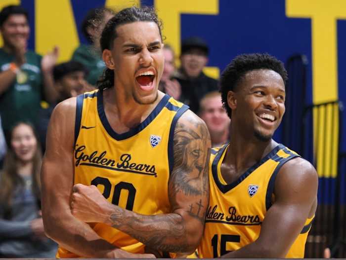 Jaylon Tyson, left, celebrates with teammate Jalen Cone