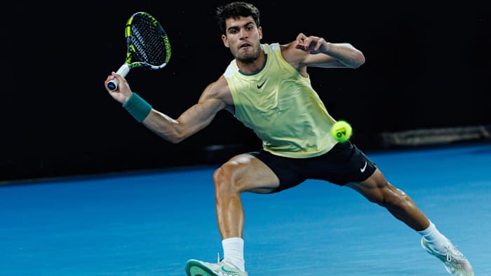 Carlos Alcaraz in action against Alexander Zverev at the Australian Open.