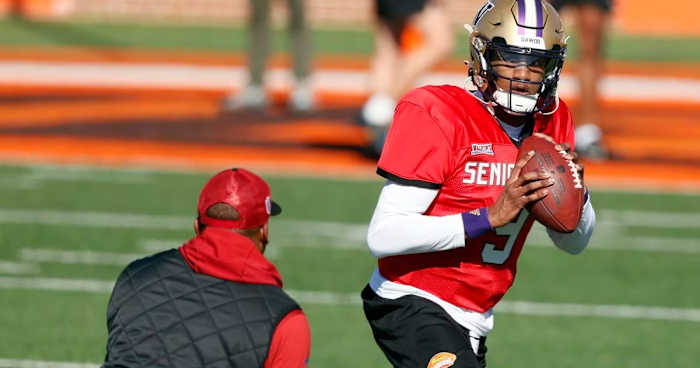National quarterback Michael Penix Jr., of Washington, runs drills during practice for the Senior Bowl, Tuesday, Jan. 30, 2024, in Mobile, Ala.