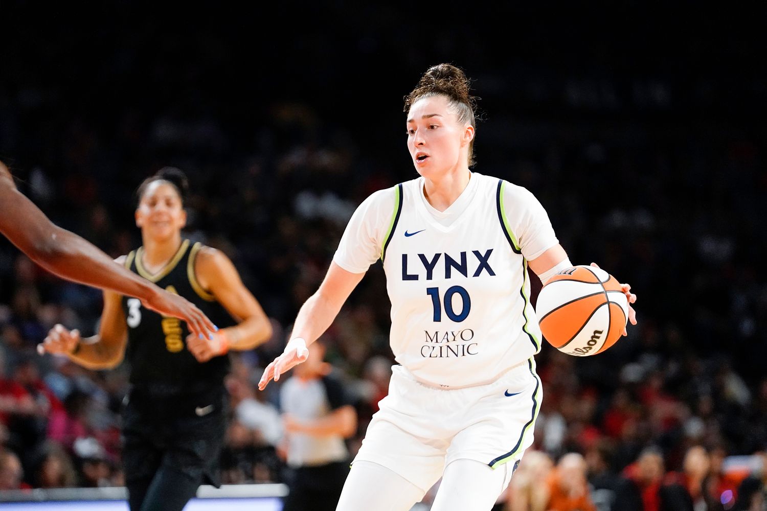 Minnesota Lynx forward Jessica Shepard (10) dribbles the ball against the Las Vegas Aces during the second quarter at Michelob Ultra Arena in Las Vegas on May 28, 2023.