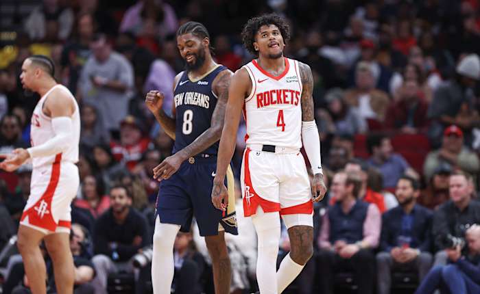 Rockets guard Jalen Green (4) and New Orleans Pelicans forward Naji Marshall (8) react after a play during the fourth quarter at Toyota Center.
