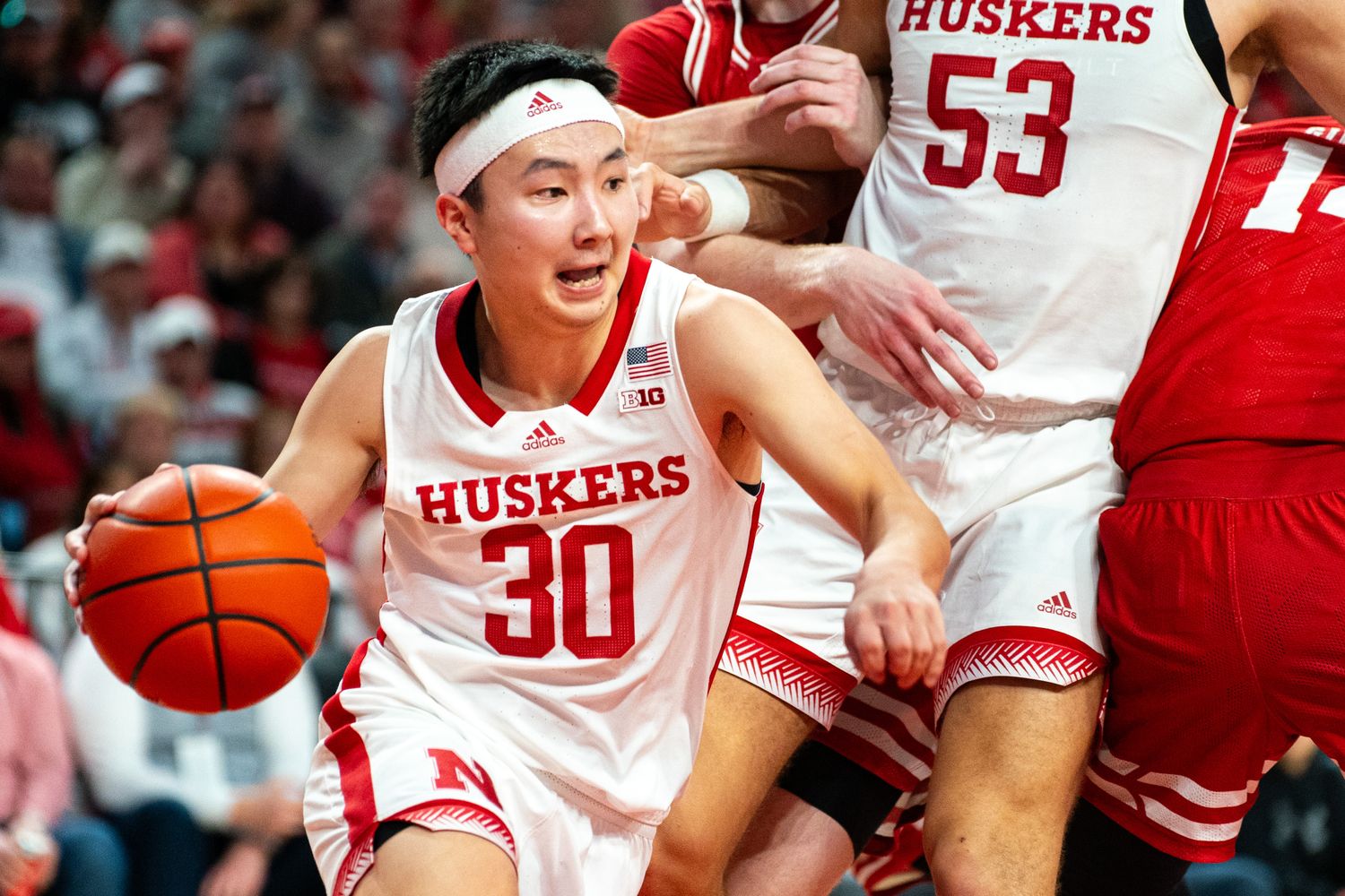 Feb 1, 2024; Lincoln, Nebraska, USA; Nebraska Cornhuskers guard Keisei Tominaga (30) drives against the Wisconsin Badgers during the first half at Pinnacle Bank Arena.