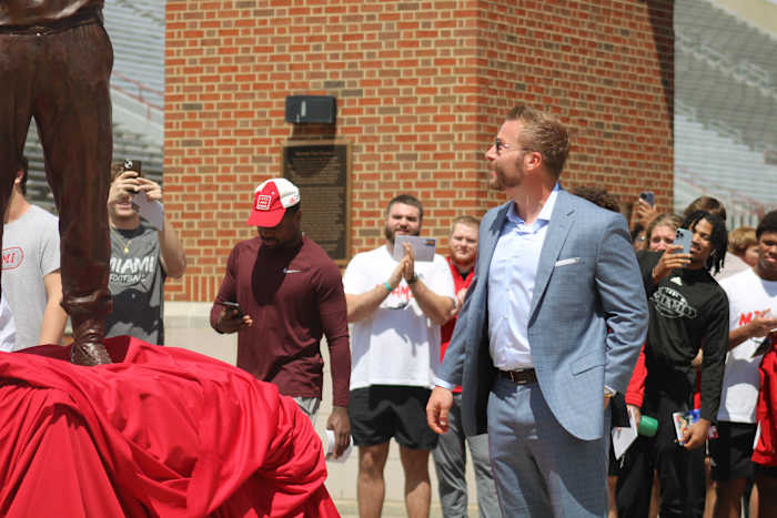 Sean McVay looks at his statue at Miami (Ohio)’s Cradle of Coaches plaza.