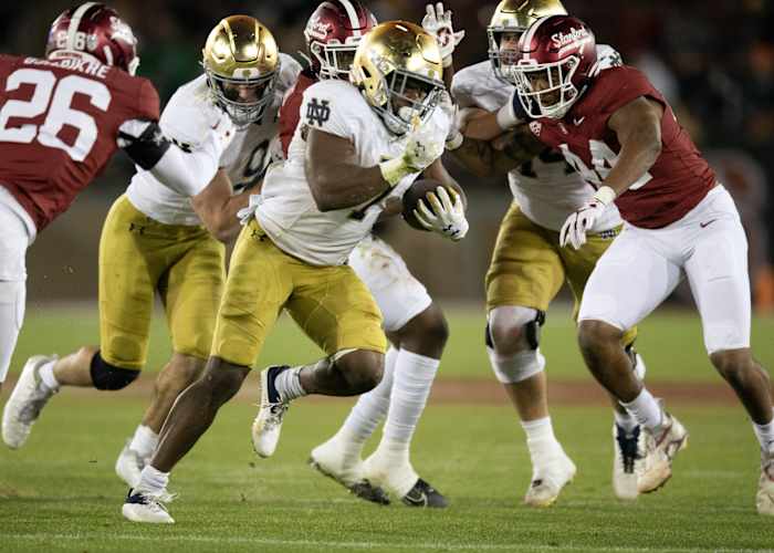 Nov 25, 2023; Stanford, California, USA; Notre Dame Fighting Irish running back Audric Estim (7) breaks free for another touchdown run against the Stanford Cardinal during the third quarter at Stanford Stadium. Mandatory Credit: D. Ross Cameron-USA TODAY Sports