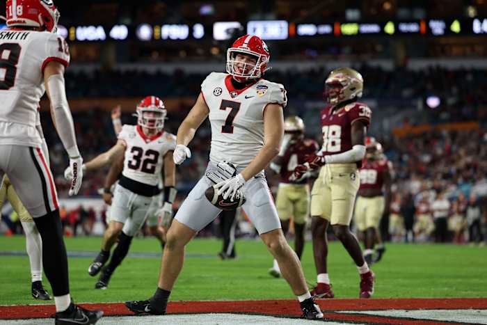 Dec 30, 2023; Miami Gardens, FL, USA; Georgia Bulldogs tight end Lawson Luckie (7) reacts after scoring a touchdown against the Florida State Seminoles during the second half in the 2023 Orange Bowl at Hard Rock Stadium.