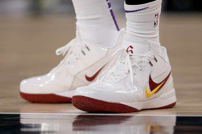 Los Angeles Lakers forward LeBron James' white and cardinal Nike sneakers.