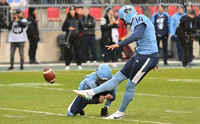 Nov 11, 2023; Toronto, Ontario, CAN; Toronto Argonauts place kicker Boris Bede (14) kicks a field goal against the Montreal Alouettes in the first half at BMO Field. Mandatory Credit: Dan Hamilton-USA TODAY Sports