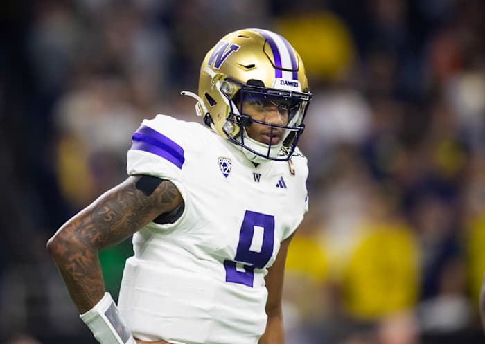 Jan 8, 2024; Houston, TX, USA; Washington Huskies quarterback Michael Penix Jr. (9) against the Michigan Wolverines during the 2024 College Football Playoff national championship game at NRG Stadium.