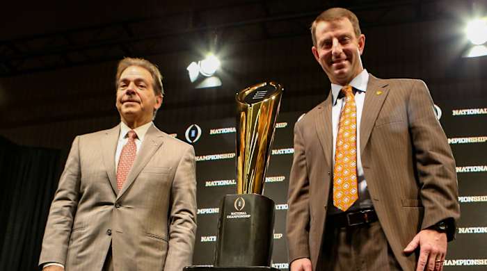 Alabama’s Nick Saban and Clemson’s Dabo Swinney pose ahead of the 2018–19 national championship game.