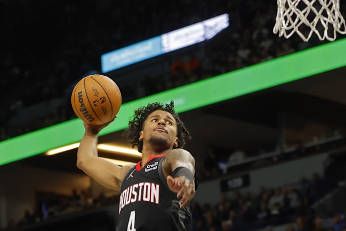 Rockets guard Jalen Green dunks against the Minnesota Timberwolves in the third quarter at Target Center.