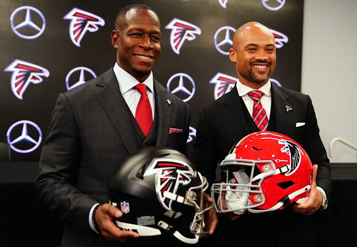 Feb 5, 2024; Atlanta, GA, USA; Atlanta Falcons head coach Raheem Morris and general manager Terry Fontenot pose for the media after Morris was introduced as the head coach of the Atlanta Falcons at Mercedes-Benz Stadium.