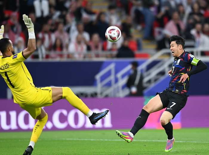 Son Heung-min pictured (right) playing for South Korea against Jordan in the semi-finals of the 2023 AFC Asian Cup in Qatar
