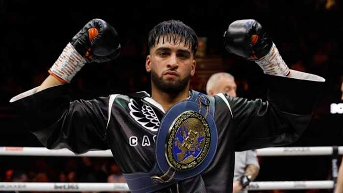 Adam Azim celebrates victory via KO against Enock Poulsen in the Euro Super-Lightweight title bout at the OVO Arena Wembley, London. ZAC GOODWIN/PA IMAGES VIA GETTY IMAGES.