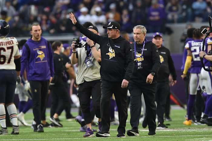Jan 9, 2022; Minneapolis, Minnesota, USA; Minnesota Vikings head coach Mike Zimmer waves to the crowd after the game against the Chicago Bears at U.S. Bank Stadium.