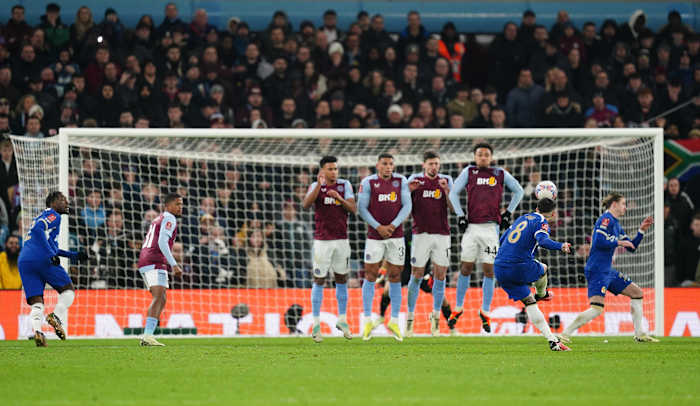 Enzo Fernandez (no.8) pictured shooting from a free-kick to score a brilliant goal for Chelsea against Aston Villa in February 2024