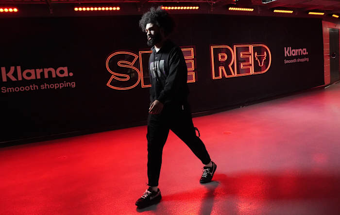 Chicago Bulls guard Coby White (0) enters the building before the game against the Minnesota Timberwolves at United Center.