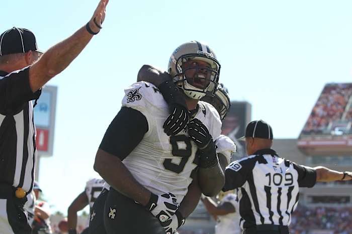 New Orleans Saints defensive end Cameron Jordan (94) reacts after he stopped the Tampa Bay Buccaneers on fourth down and goal during the second half at Raymond James Stadium. New Orleans Saints defeated the Tampa Bay Buccaneers 35-28. Mandatory Credit: Kim Klement-USA TODAY Sports
