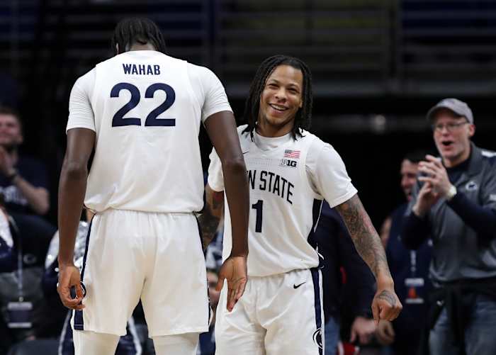 Penn State guard Ace Baldwin Jr. celebrates with Qudus Wahab during the Nittany Lions' Big Ten victory over Iowa at the Bryce Jordan Center.