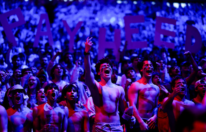 Kansas Jayhawks fans cheer prior to a game against the Houston Cougars at Allen Fieldhouse in Lawrence, Kansas, on Feb. 3, 2024.