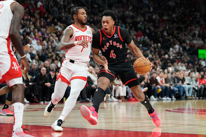 Raptors forward Scottie Barnes (4) drives to the net against Houston Rockets forward Cam Whitmore (7) during the first half at Scotiabank Arena.