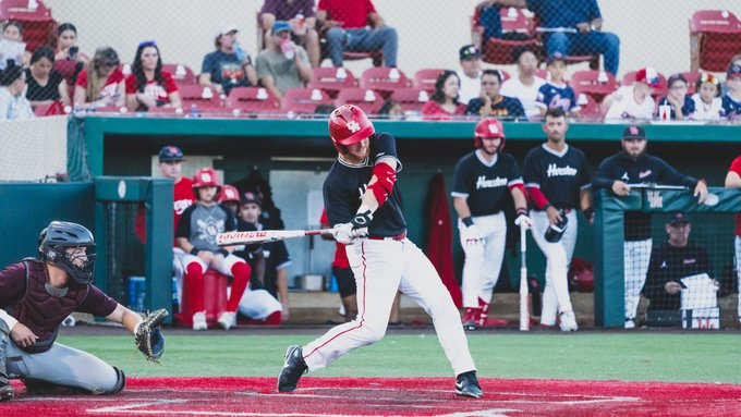 Cameron Nickens drives in a run for Team White in a Fall scrimmage. 