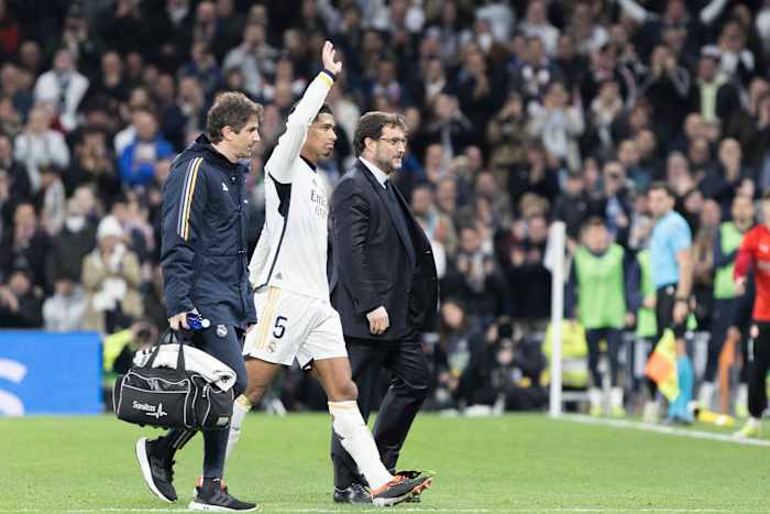 Jude Bellingham pictured (center) waving at the crowd while leaving the field with an ankle injury during Real Madrid's 4-0 win over Girona in February 2024