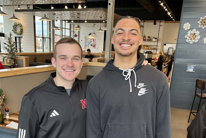 Keelan Smith with Nebraska wide receivers coach Garret McGuire.