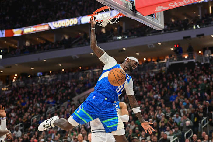 Milwaukee Bucks forward Bobby Portis (9) dunks the ball i