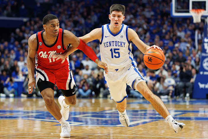 Feb 13, 2024; Lexington, Kentucky, USA; Kentucky Wildcats guard Reed Sheppard (15) drives to the basket around Ole Miss Rebels guard Matthew Murrell (11) during the second half at Rupp Arena at Central Bank Center. Mandatory Credit: Jordan Prather-USA TODAY Sports