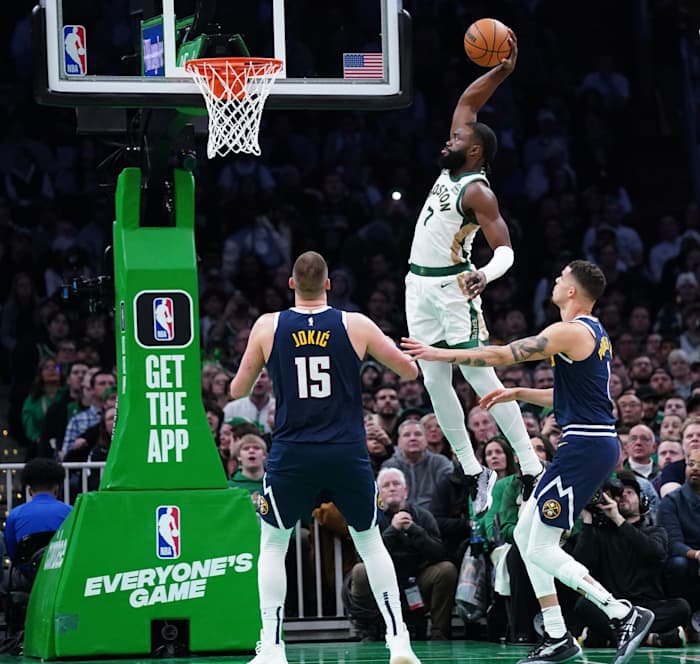 Jaylen Brown dunks against Denver