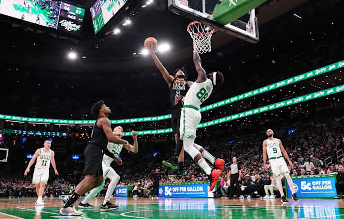  Brooklyn Nets forward Trendon Watford (9) shoots against Boston Celtics center Neemias Queta (88) in the second half at TD Garden.