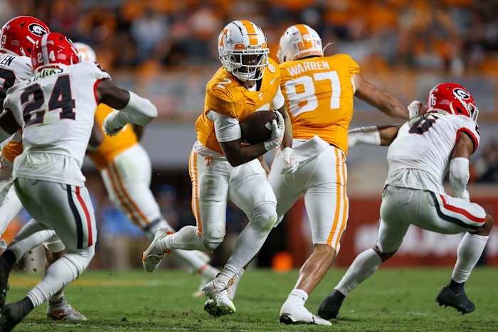 Nov 18, 2023; Knoxville, Tennessee, USA; Tennessee Volunteers running back Jabari Small (2) runs the ball against the Georgia Bulldogs during the second half at Neyland Stadium. Mandatory Credit: Randy Sartin-USA TODAY Sports