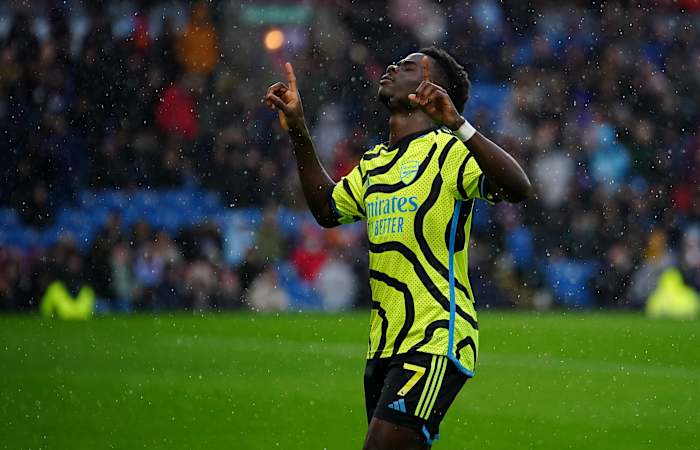 Bukayo Saka pictured celebrating after scoring two goals for Arsenal in a 5-0 win at Burnley in February 2024