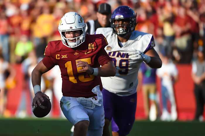 Sep 4, 2021; Ames, Iowa, USA; Iowa State Cyclones quarterback Brock Purdy (15) runs from Northern Iowa Panthers defensive lineman Khristian Boyd (99) in the second half at Jack Trice Stadium. Mandatory Credit: Steven Branscombe-USA TODAY Sports
