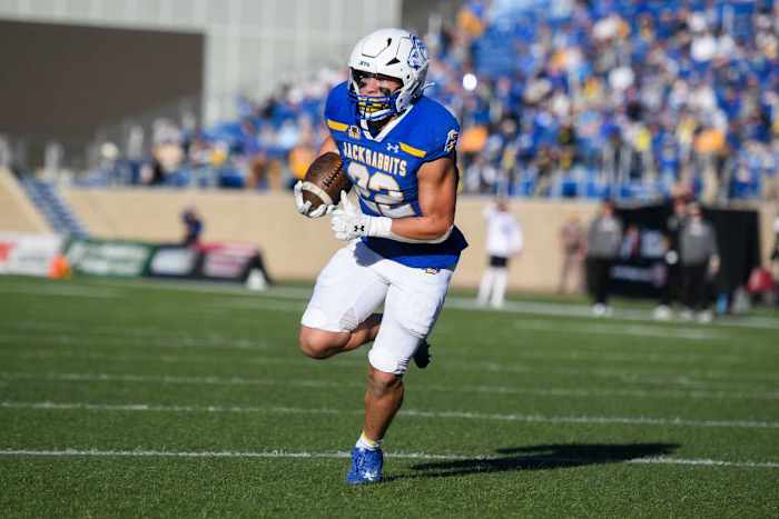 SDSU's running back Isaiah Davis (22) runs with the ball.