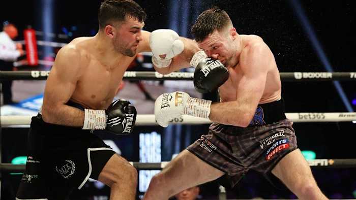 Jack Catterall throws a left into Josh Taylor at the OVO Hydro, Glasgow. Josh Taylor and Jack Catterall will square off in a highly awaited rematch on Saturday, April 27, at the First Direct Arena in Leeds. STEVE WELSH/PA VIA GETTY IMAGES.