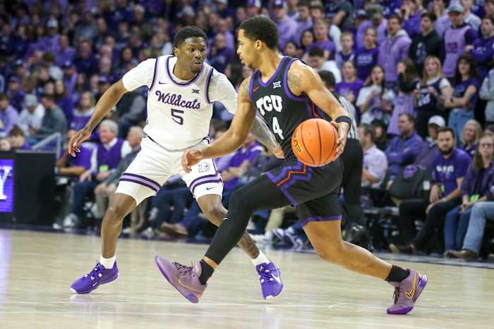 Feb 17, 2024; Manhattan, Kansas, USA; TCU Horned Frogs guard Jameer Nelson Jr. (4) is guarded by Kansas State Wildcats guard Cam Carter (5) during the first half at Bramlage Coliseum. Mandatory Credit: Scott Sewell-USA TODAY Sports