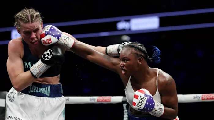 Claressa Shields (R) punches Savannah Marshall (L) during the IBF, WBA, WBC, WBO World Middleweight Title fight, which is the first women's only boxing card in the UK at The O2 Arena on in London, England. Claressa Shields looks to rematch Savannah Marshall in MMA match. JAMES CHANCE/GETTY IMAGES.