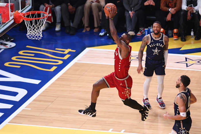 Western Conference forward LeBron James (23) of the Los Angeles Lakers dunks the ball against the Eastern Conference All-Stars during the first quarter in the 73rd NBA All Star game at Gainbridge Fieldhouse