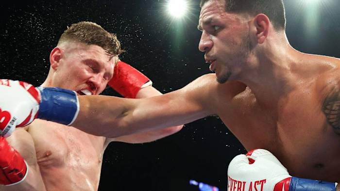Edgar Berlanga(R) punches Jason Quigley in their super-middleweight fight in the Hulu Theatre at Madison Square Garden, New York City. MATT DAVIES/PXIMAGES/ICON SPORTSWIRE VIA GETTY IMAGES.