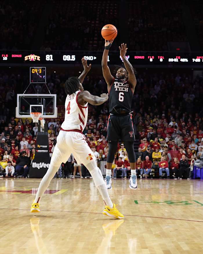 Feb 17, 2024; Ames, Iowa, USA; Texas Tech Red Raiders guard Joe Toussaint (6) shoots the ball over Iowa State Cyclones guard Demarion Watson (4) during the second half at James H. Hilton Coliseum. Mandatory Credit: Reese Strickland-USA TODAY Sports