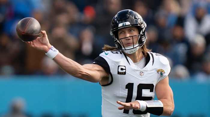 Jaguars quarterback Trevor Lawrence throws