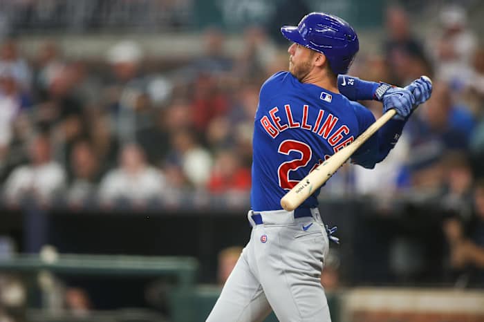 Sep 26, 2023; Atlanta, Georgia, USA; Chicago Cubs first baseman Cody Bellinger (24) hits a single against the Atlanta Braves in the second inning at Truist Park.