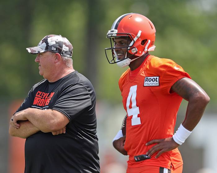 Browns quarterback Deshaun Watson and offensive coordinator Alex Van Pelt watch from the sideline during the 2022 training camp in Berea.