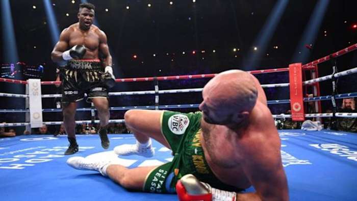 Francis Ngannou knocks down Tyson Fury during the Heavyweight fight between Tyson Fury and Francis Ngannou at Boulevard Hall. Joshua Can't Take My Power, says Ngannou laying out his game plan for the fight on March 8 in Riyadh, Saudi Arabia. JUSTIN SETTERFIELD/GETTY IMAGES.