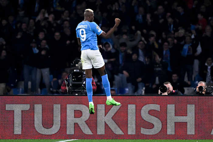 Victor Osimhen pictured celebrating after scoring for Napoli in a 1-1 draw with Barcelona in February 2024