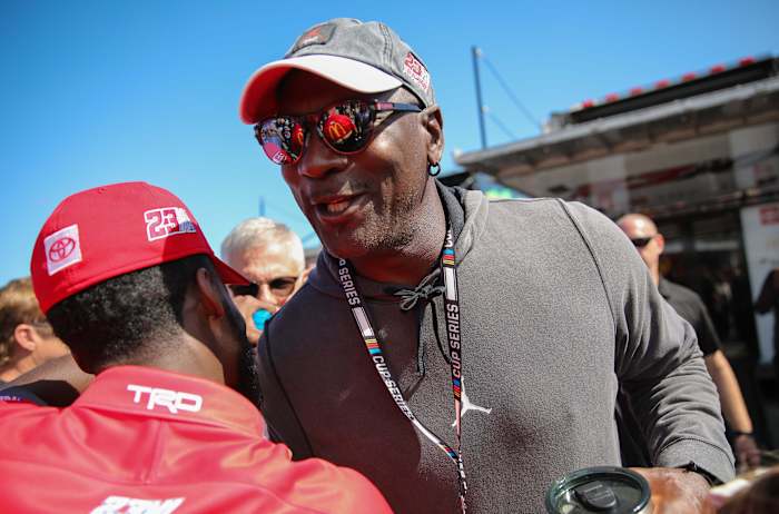 Michael Jordan greets crew members of NASCAR Cup Series driver Bubba Wallace (23) at Daytona International Speedway.
